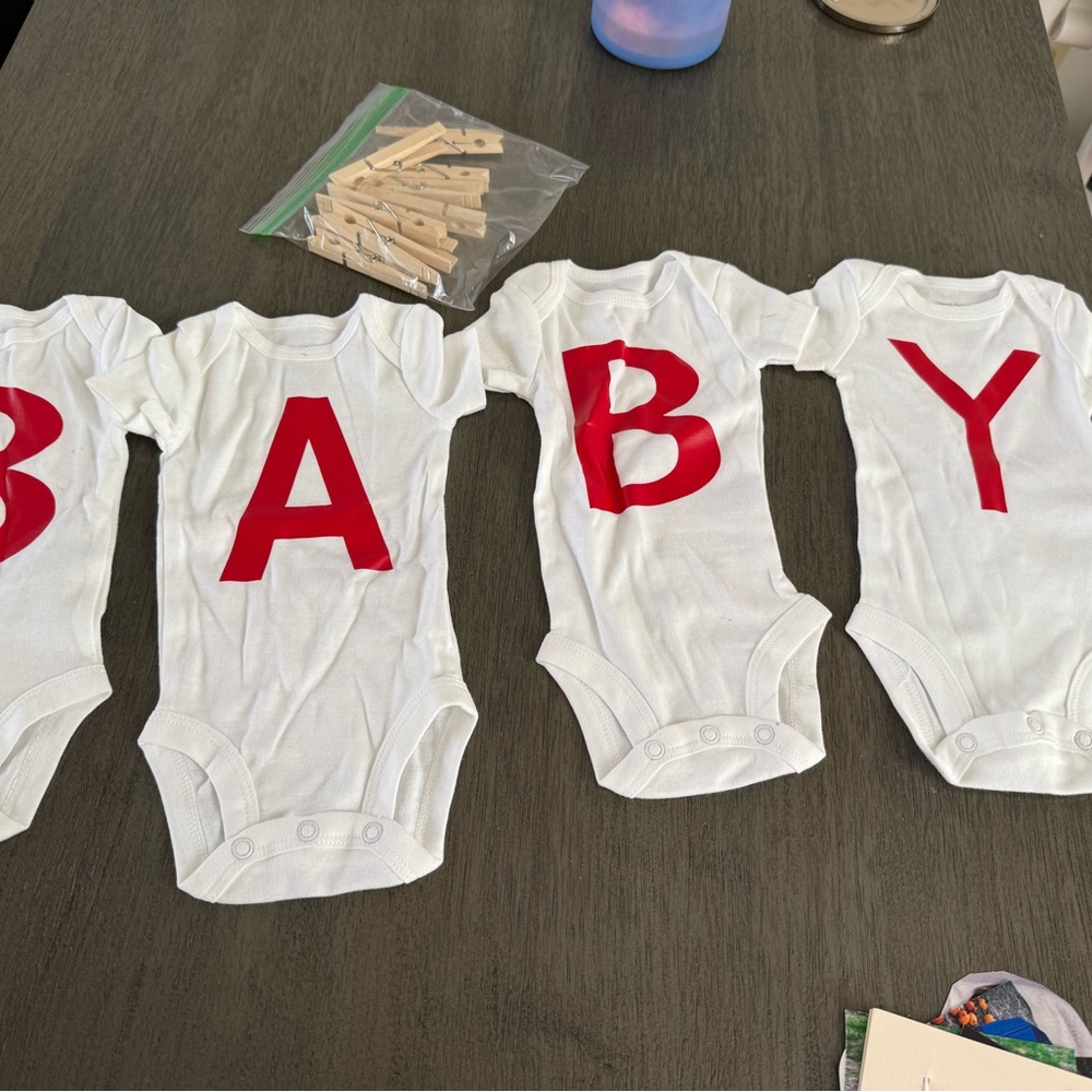 White Baby Onesies with Red Letters